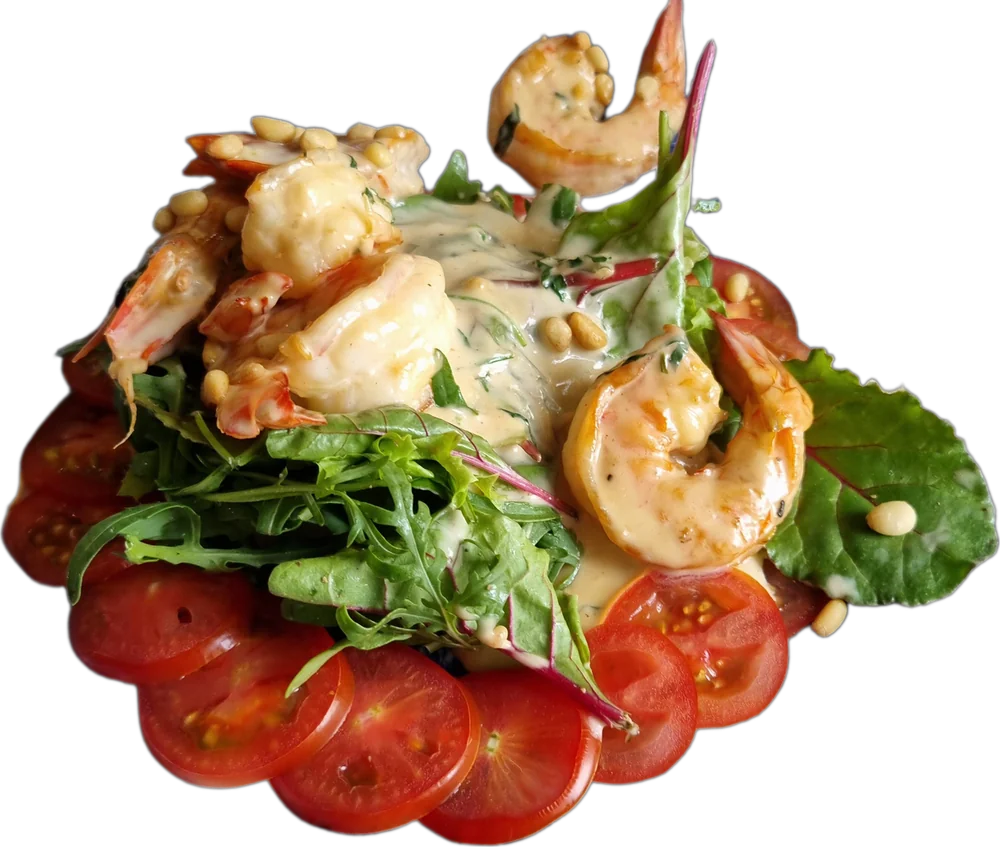 Prawns with cherry tomatoes, salad leaves and pine nuts