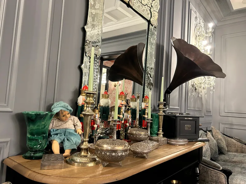 Sideboard with silver boxes, candlesticks and two gramophones